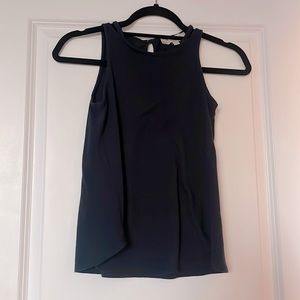 Navy sleeveless top with keyhole detail on the back.